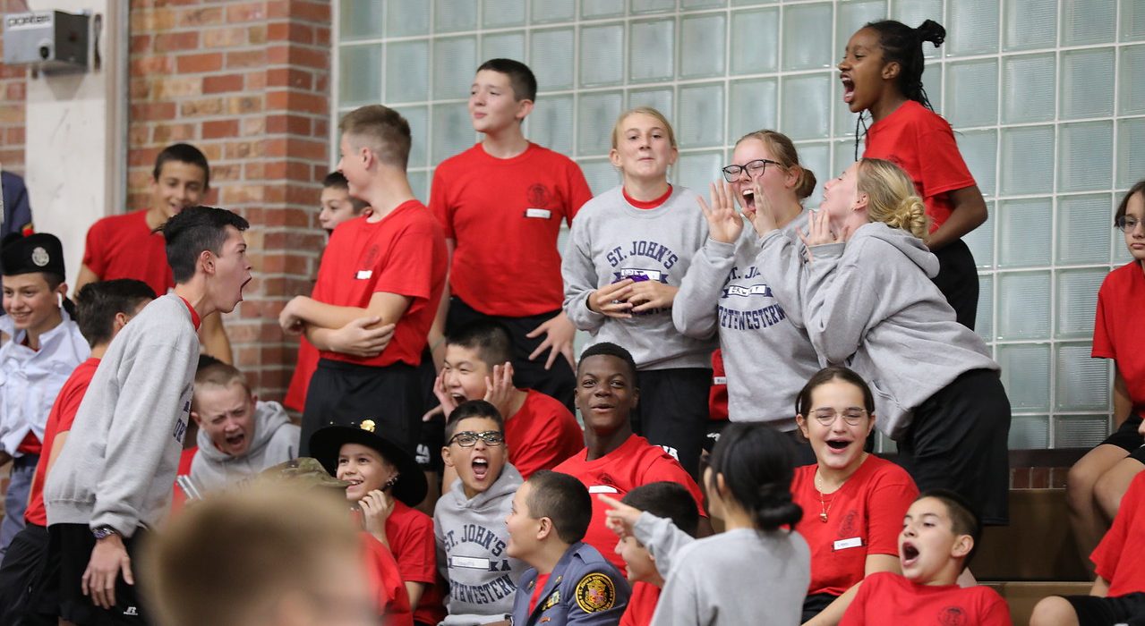 Students cheering for team