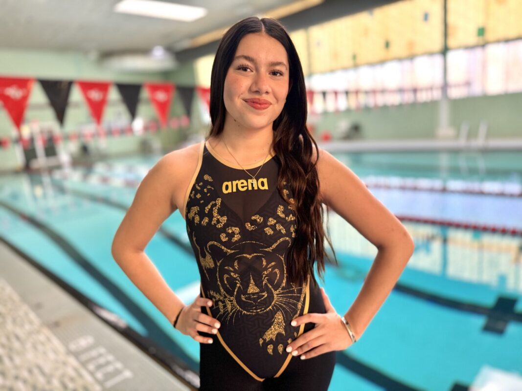 Swimmer Camila Torres poses by the SJN pool