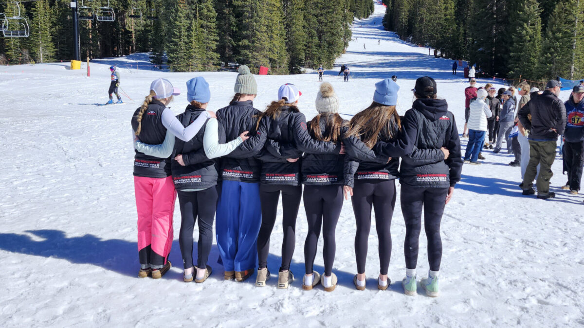 The giant slalom team looks out on the course