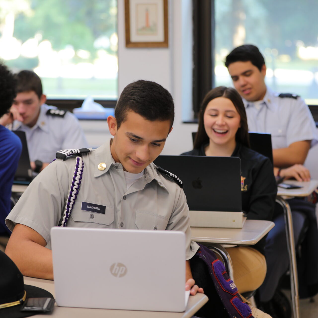 smiling students in a classroom